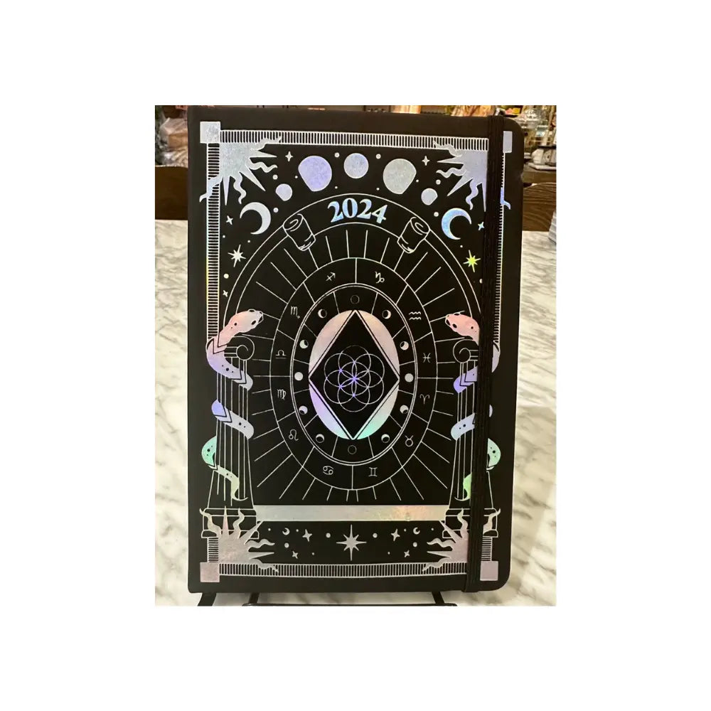 
                  
                    Moon Wisdom Planner 2024
                  
                