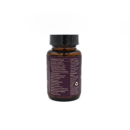 Vegetarian Ashwagandha capsules on a wooden surface representing natural Ayurvedic wellness