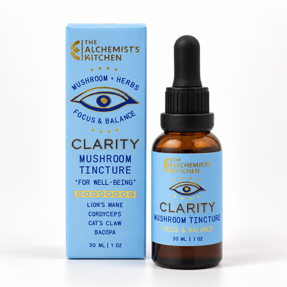 The Alchemist’s Kitchen Clarity Mushroom Tincture, 30 mL amber dropper bottle with blue label and matching box.